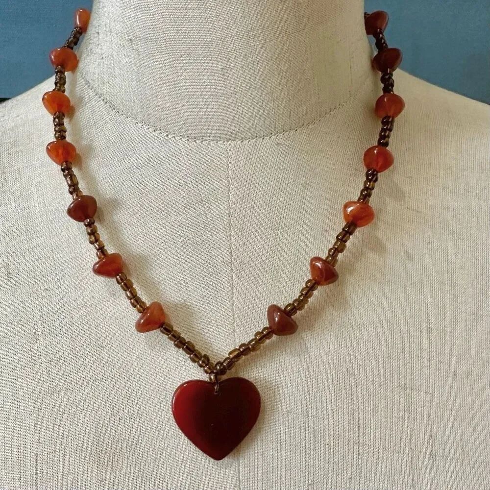 Orange beaded heart pendant necklace
